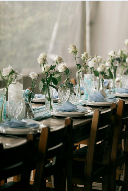 Elegant dining table setup with floral arrangements